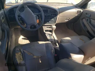 1996 Toyota Camry DX with VIN 4T1BG12K0TU744733, listed as a Copart auction lot 45302005 with 136,736 mi miles and Salvage Title. Bid and sale history available at carsss.com. Image 8.