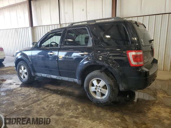 2012 Ford Escape XLT with VIN 1FMCU9D71CKC27621, listed as a Copart auction lot 62741115 with 128,254 mi miles and Salvage title. Bid and sale history available at DreamBid. Image 2.