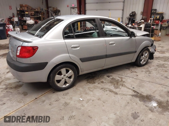 2009 Kia Rio LX with VIN KNADE223596444133, listed as a IAAI auction lot 41598865 with Not Provided miles and . Bid and sale history available at DreamBid. Image 13.