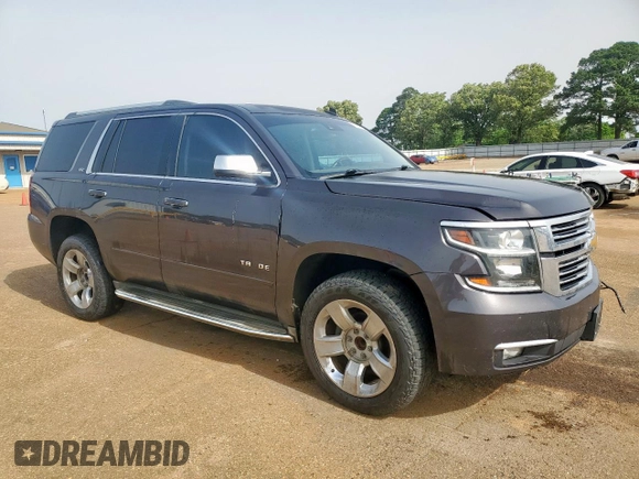 2015 Chevrolet Tahoe LTZ z VIN 1GNSCCKC8FR102859, wystawiony jako Copart lot #56755555 z przebiegiem 167 191 mil mil oraz Czysty tytuł • Clean title. Historia ofert i sprzedaży dostępna na DreamBid. Obrazek 4.