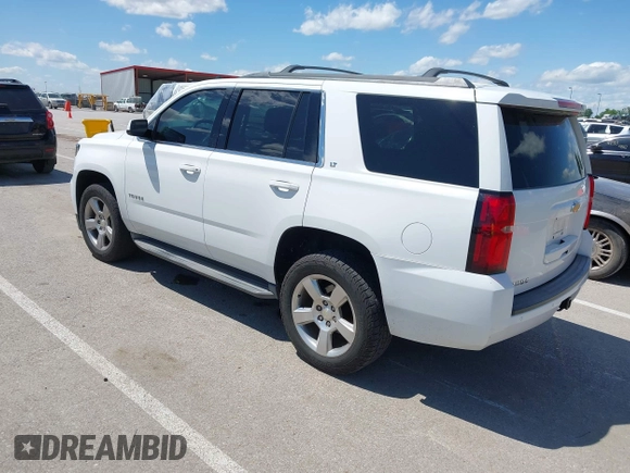 2015 Chevrolet Tahoe LT with VIN 1GNSKBKC8FR194164, listed as a IAAI auction lot 42315215 with 211,797 mi miles and . Bid and sale history available at DreamBid. Image 3.