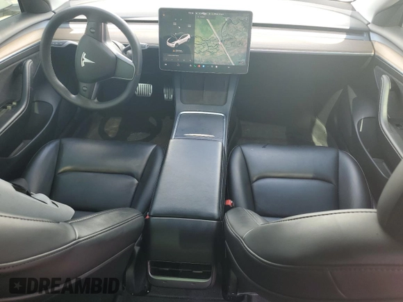 2021 Tesla Model 3 Standard Range Plus z VIN 5YJ3E1EA1MF064335, wystawiony jako Copart lot #57133955 z przebiegiem 60 024 mil mil oraz Szkody całkowita. Historia ofert i sprzedaży dostępna na DreamBid. Obrazek 8.