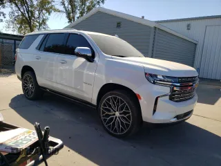 2023 Chevrolet Tahoe Premier with VIN 1GNSCSKD6PR119132, listed as a Copart auction lot 74594664 with 27,716 mi miles and Salvage title. Bid and sale history available at DreamBid. Image 4.