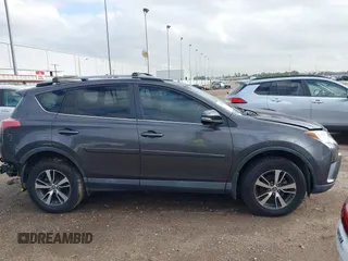 2018 Toyota RAV4 XLE with VIN 2T3WFREV4JW417555, listed as a IAAI auction lot 41092589 with 93,788 mi miles and . Bid and sale history available at DreamBid. Image 14.