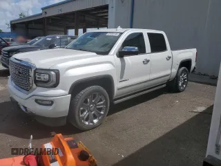 2017 GMC Sierra 1500 Denali with VIN 3GTU2PEJ9HG112342, listed as a Copart auction lot 50880135 with 90,727 mi miles and Salvage Title. Bid and sale history available at DreamBid. Image 1.