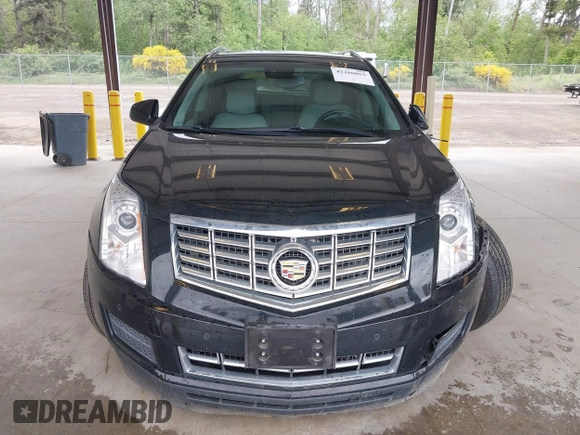2014 Cadillac SRX Luxury Collection z VIN 3GYFNEE36ES677883, wystawiony jako IAAI lot #42260861 z przebiegiem 51 730 mil mil oraz . Historia ofert i sprzedaży dostępna na DreamBid. Obrazek 12.