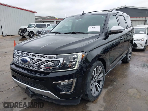 2019 Ford Expedition Platinum with VIN 1FMJU1MT8KEA02325, listed as a IAAI auction lot 41861772 with 77,124 mi miles. Bid and sale history available at carsss.com. Image 2.