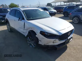 2024 Mazda CX-30 S Premium z VIN 3MVDMBDM4RM616159, wystawiony jako IAAI lot #42328334 z przebiegiem 4 614 mil mil oraz . Historia ofert i sprzedaży dostępna na DreamBid. Obrazek 1.