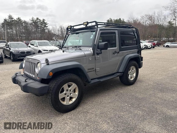 2013 Jeep Wrangler Sport with VIN 1C4AJWAG7DL605881, listed as a IAAI auction lot 41980930 with 214,662 mi miles and . Bid and sale history available at carsss.com. Image 2.