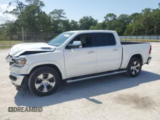 2020 Ram 1500 Laramie with VIN 1C6SRFJT5LN402007, listed as a Copart auction lot 56427815 with 79,159 mi miles and Salvage title. Bid and sale history available at DreamBid. Image 1.