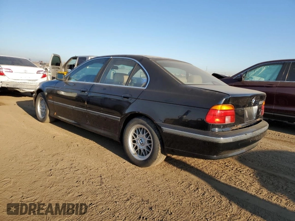 1999 BMW 5 Series 528iA with VIN WBADM634XXGU02243, listed as a Copart auction lot 74981184 with 234,566 mi miles and Salvage Title. Bid and sale history available at carsss.com. Image 2.