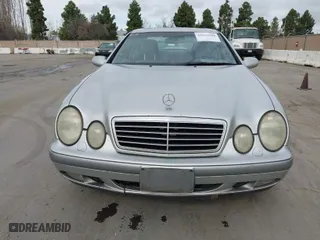 1998 Mercedes-Benz CLK-Class with VIN WDBLJ65G7WF030460, listed as a IAAI auction lot 41633288 with 327,848 mi miles. Bid and sale history available at carsss.com. Image 6.