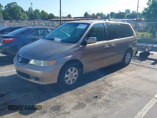 2004 Honda Odyssey EX-L with VIN 5FNRL18044B072819, listed as a IAAI auction lot 42441279 with 264,950 mi miles and . Bid and sale history available at DreamBid. Image 2.