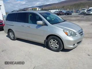 2006 Honda Odyssey EX-L with VIN 5FNRL38686B443421, listed as a IAAI auction lot 41986083 with 140,784 mi miles. Bid and sale history available at carsss.com. Image 1.