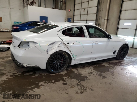2022 Genesis G70 Launch Edition with VIN KMTG14TE6NU082327, listed as a Copart auction lot 83099774 with 33,479 mi miles and Salvage Title. Bid and sale history available at DreamBid. Image 3.