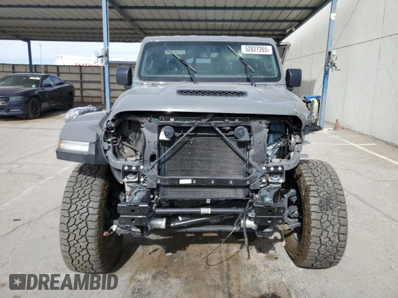 2023 Jeep Gladiator Mojave z VIN 1C6JJTEG7PL548084, wystawiony jako Copart lot #52827265 z przebiegiem 26 789 mil mil oraz Czysty tytuł • Clean title. Historia ofert i sprzedaży dostępna na DreamBid. Obrazek 5.
