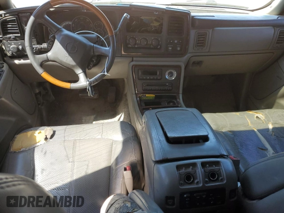 2002 Cadillac Escalade z VIN 1GYEK63N82R329743, wystawiony jako Copart lot #56587295 z przebiegiem 215 694 mil mil oraz Szkoda całkowita • Salvage title. Historia ofert i sprzedaży dostępna na DreamBid. Obrazek 8.