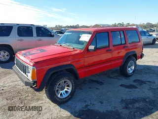 1996 Jeep Cherokee SE with VIN 1J4FT28S0TL225891, listed as a IAAI auction lot 41411705 with 233,983 mi miles and . Bid and sale history available at DreamBid. Image 2.