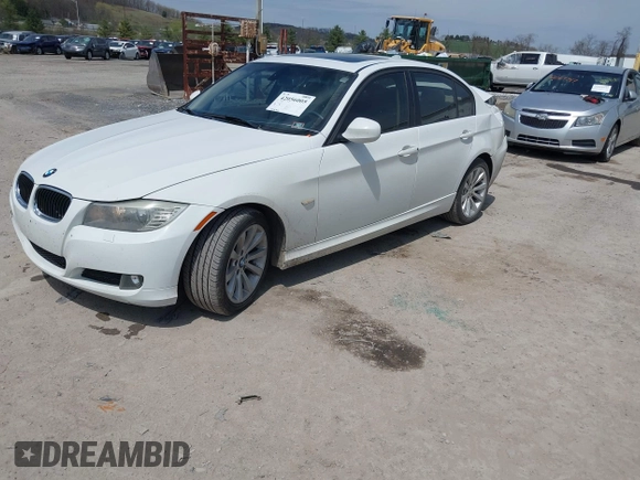 2011 BMW 3 Series 328i xDrive with VIN WBAPK7C54BF195252, listed as a IAAI auction lot 42056005 with 101,645 mi miles. Bid and sale history available at carsss.com. Image 2.