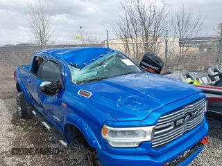2022 Ram 2500 Laramie with VIN 3C6UR5FJ7NG159600, listed as a IAAI auction lot 41679214 with 36,473 mi miles. Bid and sale history available at carsss.com. Image 4.