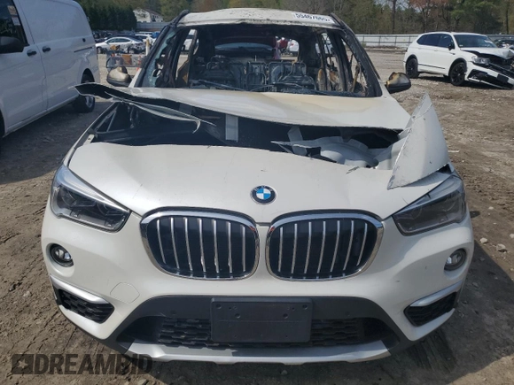 2019 BMW X1 xDrive28i with VIN WBXHT3C55K5L89892, listed as a Copart auction lot 55467665 with Not provided miles and Salvage title. Bid and sale history available at DreamBid. Image 5.