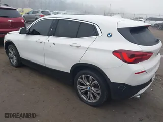 2022 BMW X2 sDrive28i with VIN WBXYH9C04N5U25732, listed as a IAAI auction lot 41015169 with 65,526 mi miles. Bid and sale history available at carsss.com. Image 3.