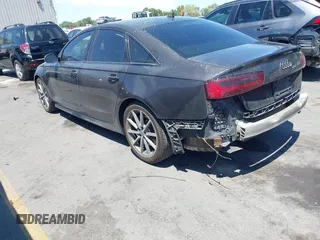 2017 Audi A6 Premium Plus with VIN WAUG8AFC2HN123907, listed as a IAAI auction lot 42609849 with 80,349 mi miles and . Bid and sale history available at DreamBid. Image 3.