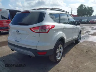 2014 Ford Escape SE with VIN 1FMCU0GX2EUA02753, listed as a IAAI auction lot 42191334 with 205,289 mi miles. Bid and sale history available at carsss.com. Image 4.