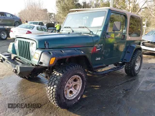 2001 Jeep Wrangler Sport with VIN 1J4FA49S71P315061, listed as a IAAI auction lot 41525441 with 178,809 mi miles. Bid and sale history available at carsss.com. Image 17.