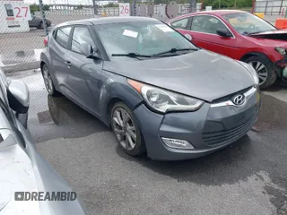 2017 Hyundai Veloster with VIN KMHTC6AD7HU305097, listed as a IAAI auction lot 41985749 with 144,753 mi miles. Bid and sale history available at carsss.com. Image 1.