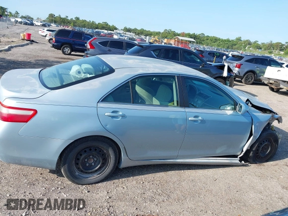 2007 Toyota Camry CE z VIN 4T1BE46K97U714024, wystawiony jako IAAI lot #42416410 z przebiegiem 218 500 mil mil oraz . Historia ofert i sprzedaży dostępna na DreamBid. Obrazek 13.