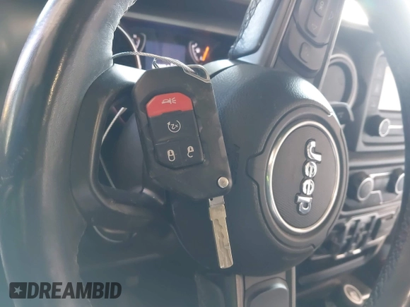 2020 Jeep Wrangler Unlimited Sport S с VIN 1C4HJXDG1LW189100, выставлен на аукционе IAAI как лот 40994680 с пробегом 172 039 миль миль и . История ставок и продаж доступна на DreamBid. Изображение 11.