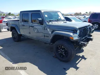 2022 Jeep Gladiator Texas Trail with VIN 1C6HJTAG5NL132990, listed as a IAAI auction lot 42514388 with 38,601 mi miles and . Bid and sale history available at DreamBid. Image 1.