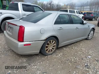 2008 Cadillac STS RWD w/1SB with VIN 1G6DW67V080126989, listed as a IAAI auction lot 42137899 with 123,638 mi miles. Bid and sale history available at carsss.com. Image 4.