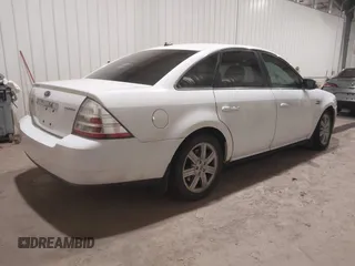 2008 Ford Taurus Limited with VIN 1FAHP25W28G173633, listed as a IAAI auction lot 40994885 with 133,974 mi miles. Bid and sale history available at carsss.com. Image 4.