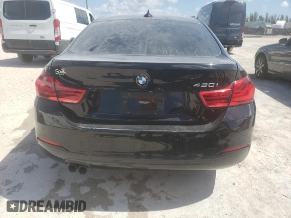 2019 BMW 4 Series 430i with VIN WBA4J1C59KBM18704, listed as a Copart auction lot 61022375 with 77,778 mi miles and Clean title. Bid and sale history available at DreamBid. Image 6.