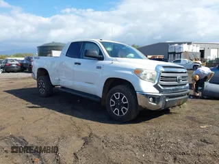 2014 Toyota Tundra 4WD Truck SR with VIN 5TFUY5F1XEX385475, listed as a IAAI auction lot 41563188 with 135,310 mi miles. Bid and sale history available at carsss.com. Image 1.