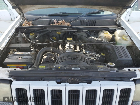 1996 Jeep Grand Cherokee Limited с VIN 1J4GZ78S2TY123592, выставлен на аукционе Copart как лот 84387624 с пробегом Не указан миль и Списание • Salvage title. История ставок и продаж доступна на DreamBid. Изображение 11.