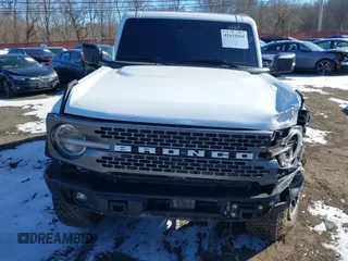 2023 Ford Bronco z VIN 1FMEE5DP1PLC08565, wystawiony jako IAAI lot #41610564 z przebiegiem 19 244 mil mil oraz . Historia ofert i sprzedaży dostępna na DreamBid. Obrazek 12.
