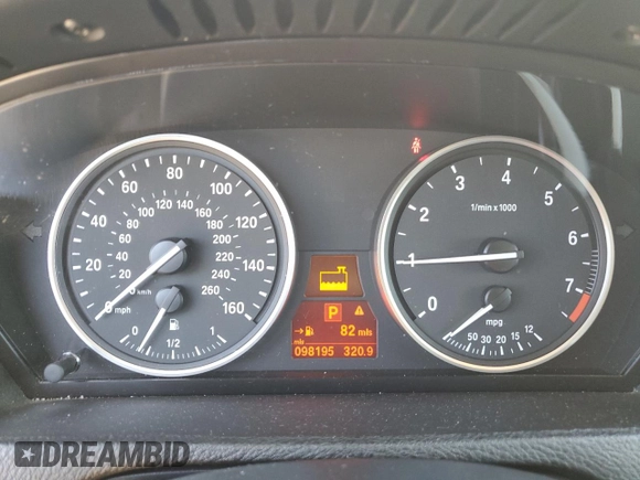2012 BMW X5 35i with VIN 5UXZV4C5XCL987618, listed as a Copart auction lot 60308965 with 98,195 mi miles and Salvage title. Bid and sale history available at DreamBid. Image 9.