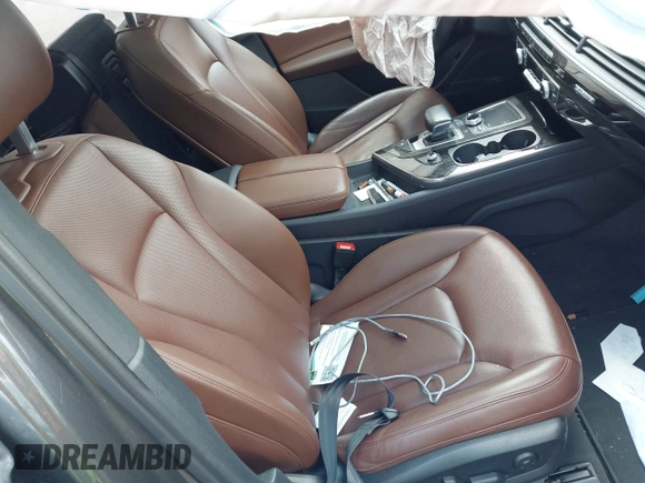 2018 Audi Q7 Prestige with VIN WA1VAAF75JD036199, listed as a IAAI auction lot 42557507 with 104,644 mi miles and . Bid and sale history available at DreamBid. Image 5.