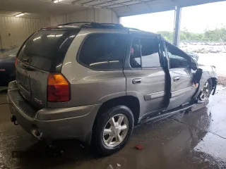 2005 GMC Envoy SLT z VIN 1GKDS13S152270398, wystawiony jako Copart lot #56160625 z przebiegiem 123 260 mil mil oraz Szkoda całkowita • Salvage title. Historia ofert i sprzedaży dostępna na DreamBid. Obrazek 3.