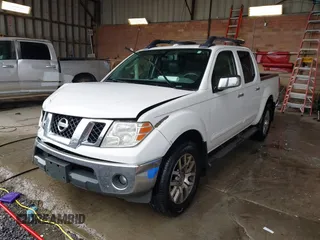 2011 Nissan Frontier Pro-4X with VIN 1N6AD0EV3BC409184, listed as a IAAI auction lot 42122823 with 209,669 mi miles and . Bid and sale history available at DreamBid. Image 2.