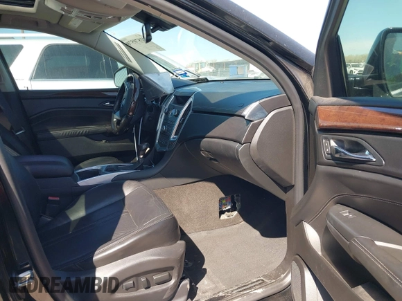 2012 Cadillac SRX Performance Collection with VIN 3GYFNBE38CS544151, listed as a IAAI auction lot 41870570 with 208,153 mi miles and . Bid and sale history available at DreamBid. Image 5.