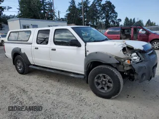 2003 Nissan Frontier XE with VIN 1N6ED29X13C419979, listed as a Copart auction lot 65806585 with 167,535 mi miles and Salvage title. Bid and sale history available at DreamBid. Image 4.