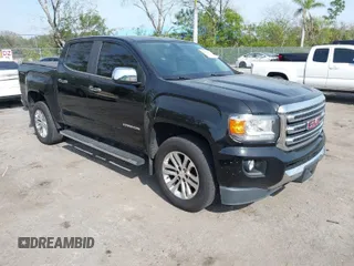 2017 GMC Canyon 4WD SLT with VIN 1GTG6DEN0H1309336, listed as a IAAI auction lot 41417971 with 125,572 mi miles. Bid and sale history available at carsss.com. Image 1.