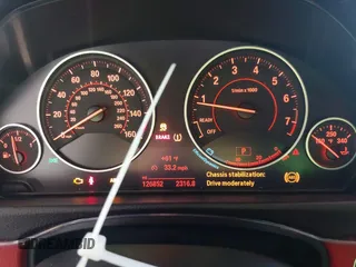 2015 BMW 4 Series 428i with VIN WBA4A5C54FG051307, listed as a IAAI auction lot 41774596 with 126,852 mi miles and . Bid and sale history available at carsss.com. Image 7.
