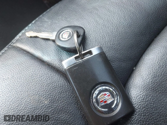 2011 Cadillac CTS with VIN 1G6DC5EY0B0163841, listed as a IAAI auction lot 42409886 with 119,231 mi miles and . Bid and sale history available at DreamBid. Image 11.