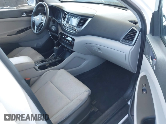 2017 Hyundai Tucson SE with VIN KM8J33A43HU464978, listed as a IAAI auction lot 41655832 with 135,359 mi miles. Bid and sale history available at carsss.com. Image 5.
