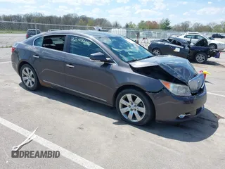 2012 Buick LaCrosse Leather z VIN 1G4GC5E3XCF357737, wystawiony jako IAAI lot #42108147 z przebiegiem 152 985 mil mil oraz . Historia ofert i sprzedaży dostępna na DreamBid. Obrazek 1.